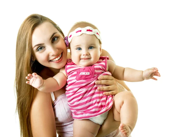 Jonge moeder met haar baby dochter blij brede glimlach, studio portra — Stockfoto