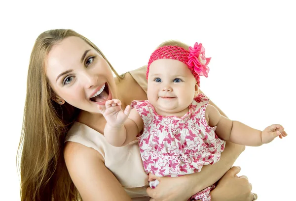 Jonge moeder met haar baby dochter blij brede glimlach, studio portra — Stockfoto