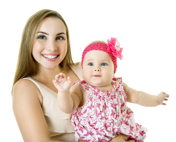 Jonge moeder met haar baby dochter blij brede glimlach, studio portra — Stockfoto