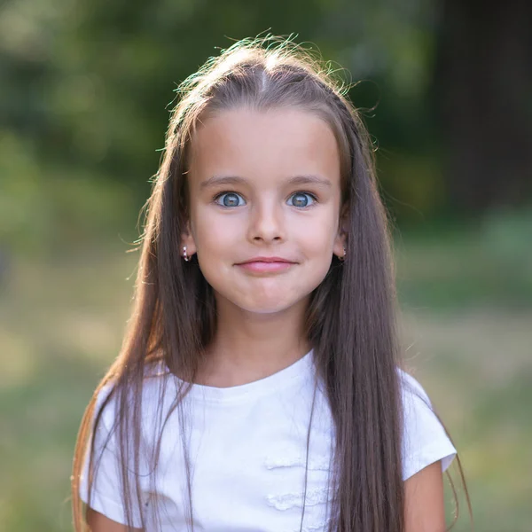 Surprise Pretty Funny Little Girl Long Brown Hair Posing Summer — Stock Photo, Image