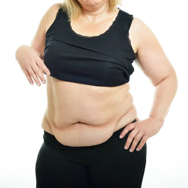 Overweight Middle Aged Woman Shows Belly Fat Isolated White Background — Stock Photo, Image