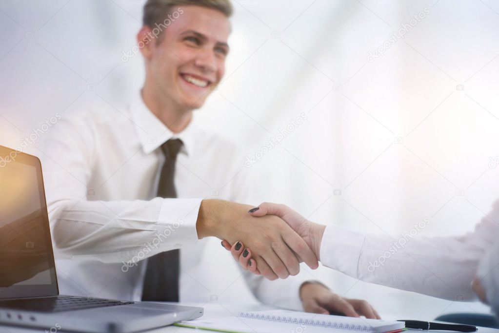 Hand shake at the end of a business meeting