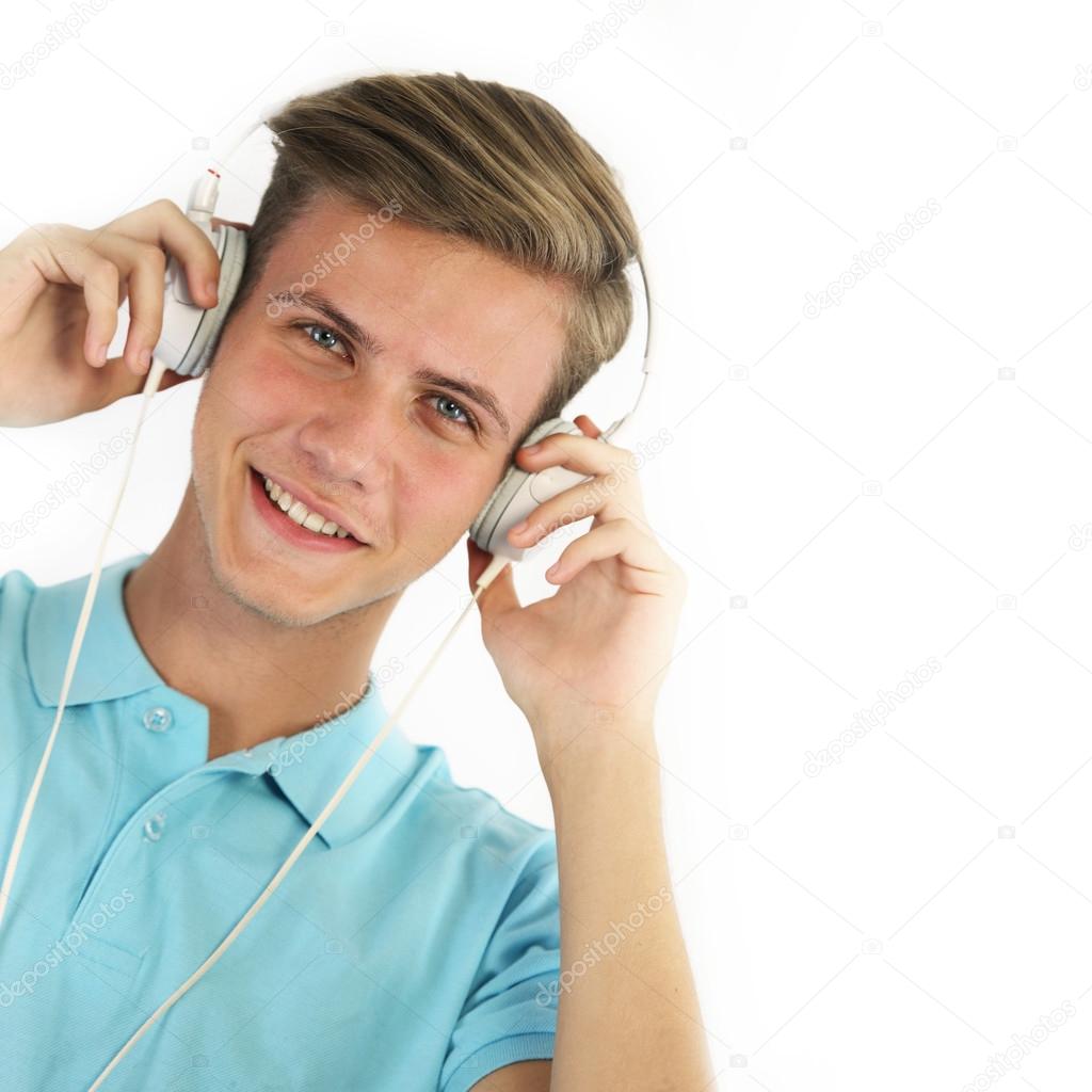young man listening to music stock photo emiliau 125594006