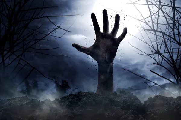 Zombie hand rising from the ground — Stock Photo, Image