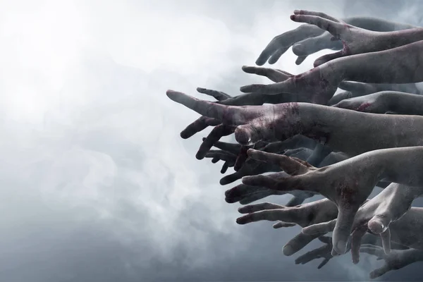 Zombi duman arka plan üzerinde eller