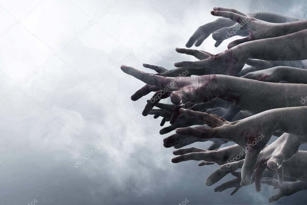 Zombie hands on smoke background