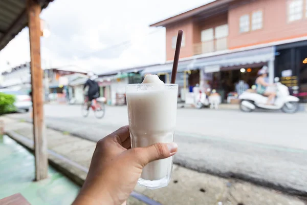 Glass of coconut juice smoothie — Stock Photo, Image