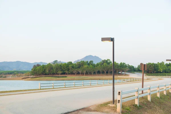 Streetlight on local road — Stock Photo, Image