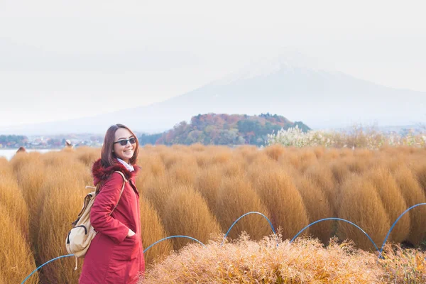 Happy woman relax travel in Japan. Smile and happy trip travel nature in Japan at Autumn.