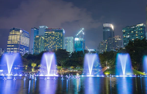 Luminous Fountain in the garden. — Stock Photo, Image