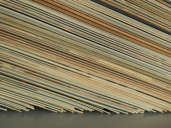 Barevné hromádky papírové pozadí — Stock fotografie