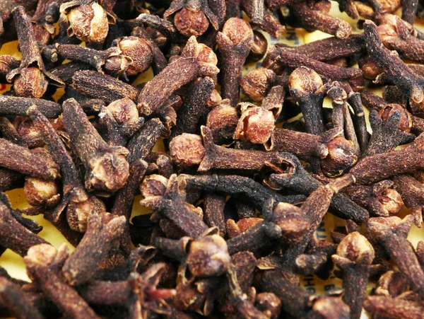 Krydda kryddnejlika bakgrunden - färgbild — Stockfoto