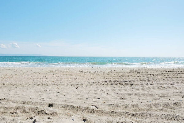 Beach and sea in bright sunlight