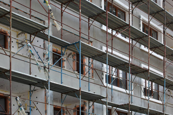 Renovation of a new building. New construction, external wall insulation.