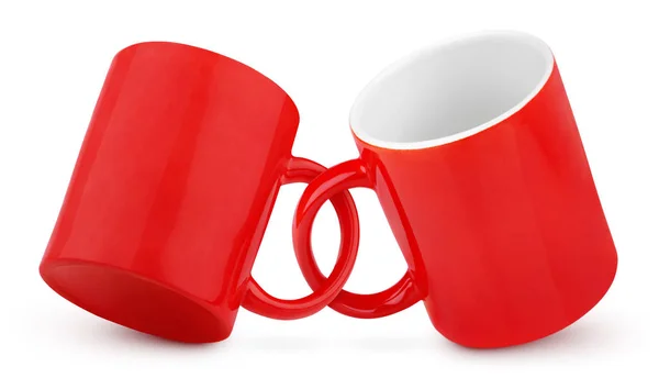 Duas canecas vermelhas acopladas — Fotografia de Stock
