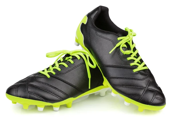 Zapatos de fútbol de cuero negro o botas de fútbol aisladas sobre fondo blanco Imagen De Stock