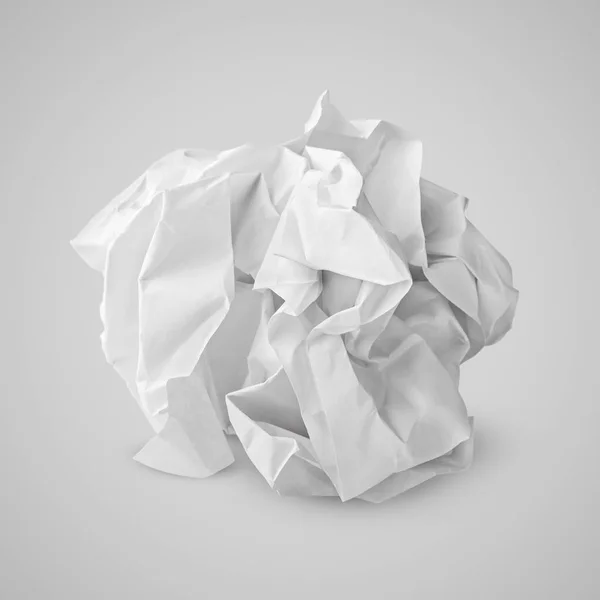 Crumpled paper ball on gray — Stock Photo, Image