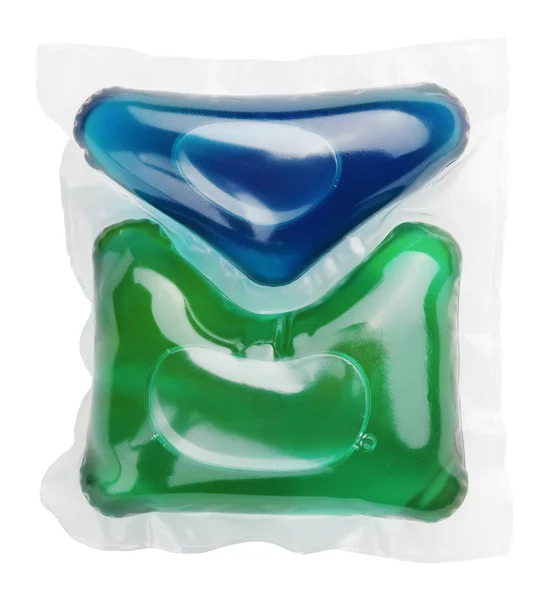 Gel capsule with laundry detergent on white — Stock Photo, Image