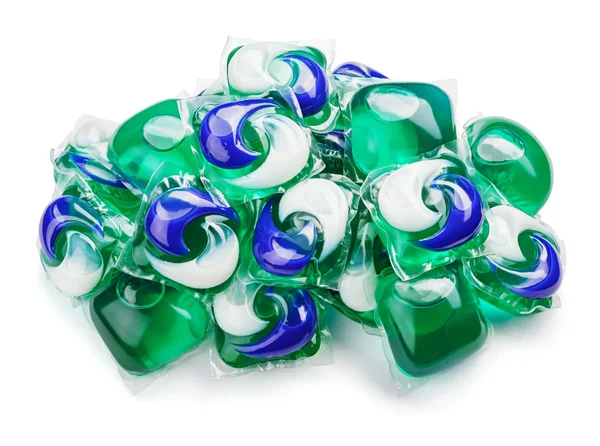 Gel capsule pods with laundry detergent on white — Stock Photo, Image