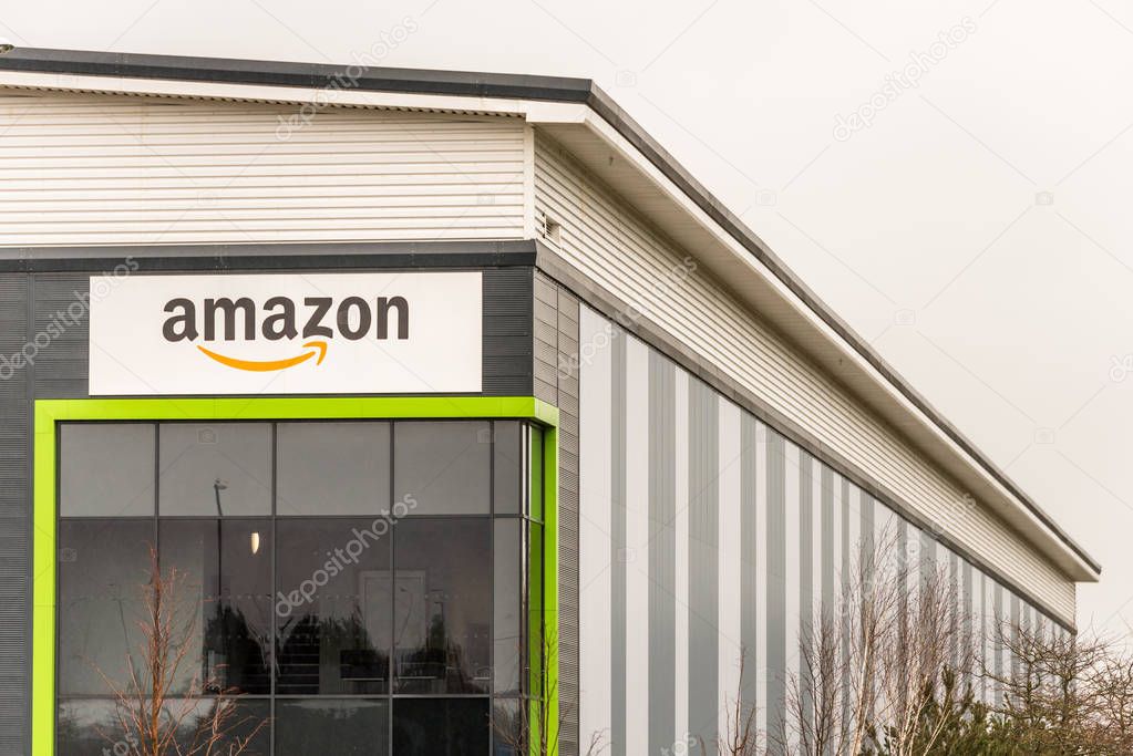 Northampton UK January 23 2018: Amazon Logistics Marketplace logo sign on warehouse wall in Grange Park Industrial.
