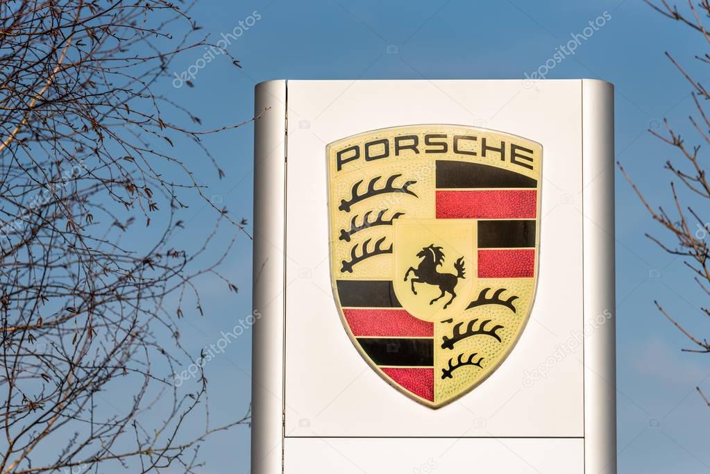 Northampton UK February 24 2018: Porsche logo sign stand in Northampton Town Centre.