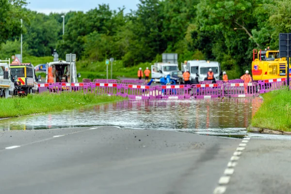 flood road in england blocked for emergency