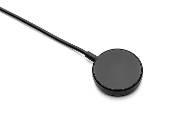 Smart watch wireless charging pad on white background — Stock Photo, Image