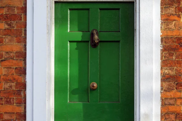 Vieja puerta piedra pared edificio textura en Inglaterra Reino Unido — Foto de Stock