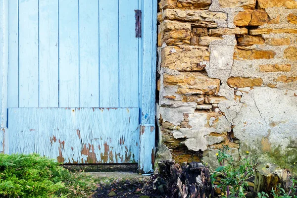 Staré dveře kámen zeď budova textura v Anglii uk — Stock fotografie