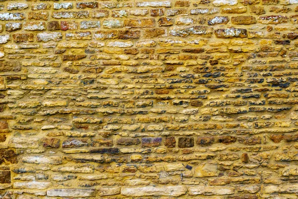 Viejo muro de piedra textura de construcción en Inglaterra Reino Unido —  Fotos de Stock