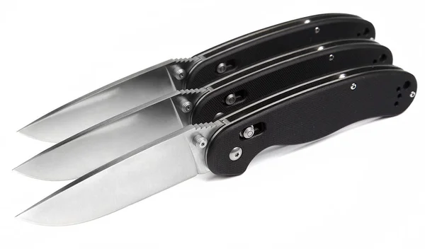 Три классических складных ножа — стоковое фото