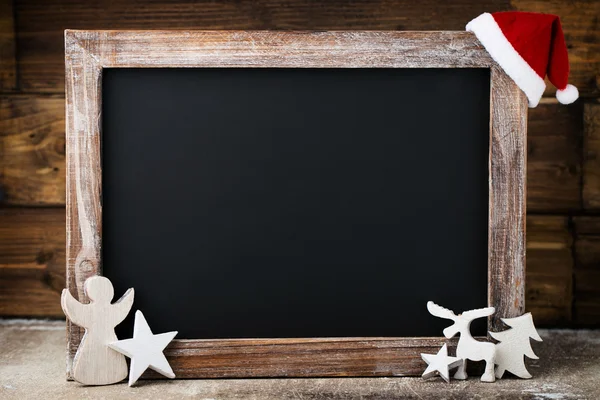 Christmas chalkboard with decoration. Santa hat, stars,  Wooden — Stock Photo, Image