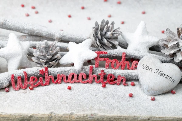 Червоні листи з німецьким Frohe Weihnachten означає Різдвом. — стокове фото