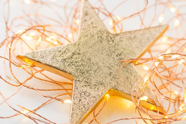 Boże Narodzenie złote gwiazdy dekoracji na abstrakcyjnym tle. — Zdjęcie stockowe