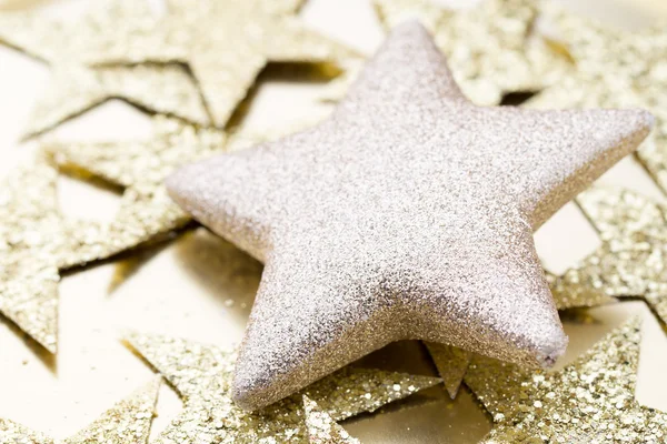 Natale oro stelle decorazione su sfondo astratto. — Foto Stock