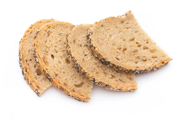 Wit brood, volkoren brood gesneden op een houten tafel. — Stockfoto