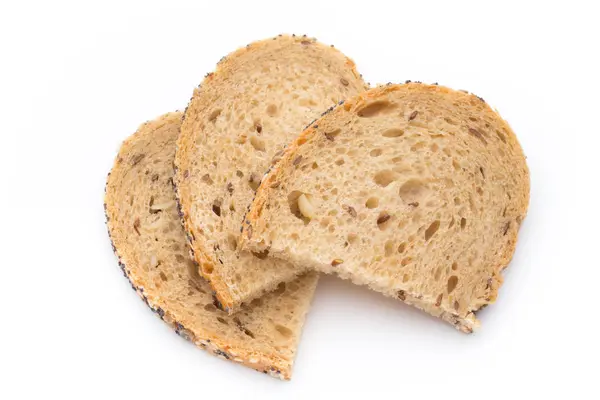 白面包切片全麦面包木桌上. — 图库照片