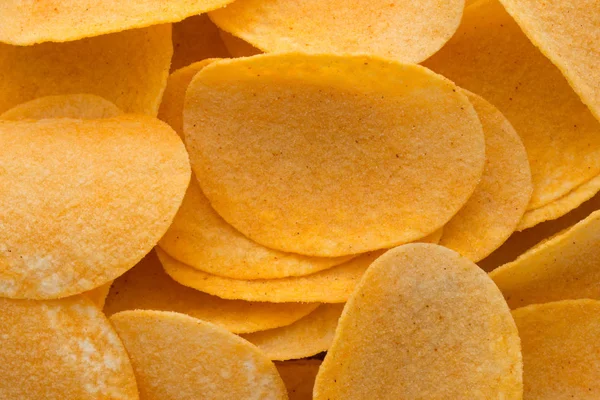 Close up potato chips on wood top view background. — Stock Photo, Image