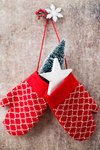 Red mittens gloves on christmas wooden background. — Stock Photo, Image