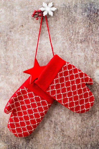 Red mittens gloves on christmas wooden background. — Stock Photo, Image