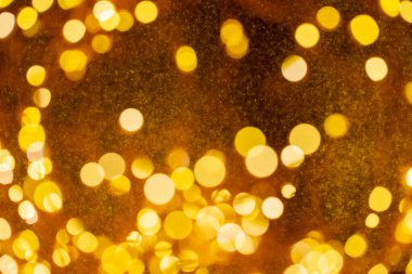 Bulanık altın bokeh afiş arka planında Mutlu Noeller.