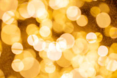 Bulanık altın bokeh afiş arka planında Mutlu Noeller.