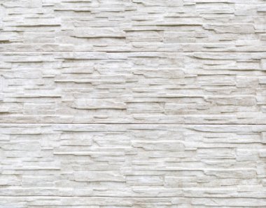 Arka plandaki eski tuğla duvar.