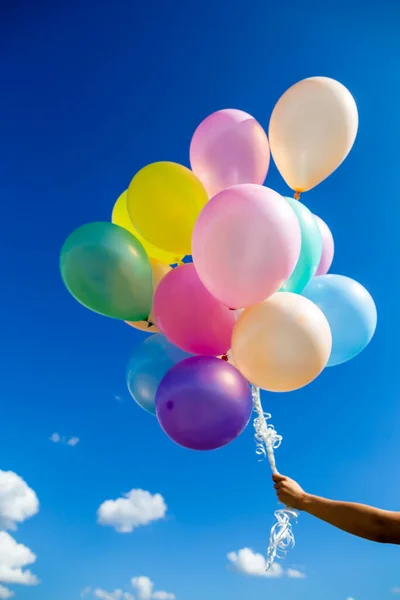 Colorful balloons done with a retro instagram filter effect. Concept of happy birth day in summer and wedding, honeymoon party use for background. Vintage color tone style.