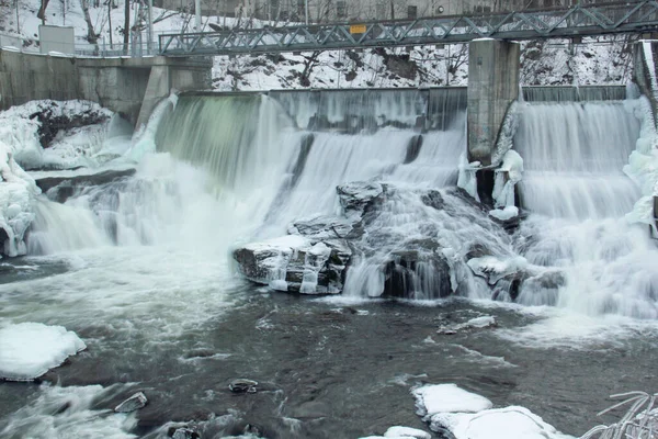 Frozen waterfall flow from an electrical barrage — Stock Photo, Image