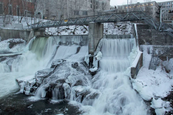 Frozen waterfall flow from an electrical barrage — Stock Photo, Image