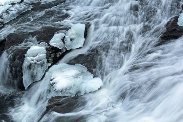 Frozen waterfall flow from an electrical barrage — Stock Photo, Image