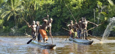 Canoe war ceremony of Asmat people clipart