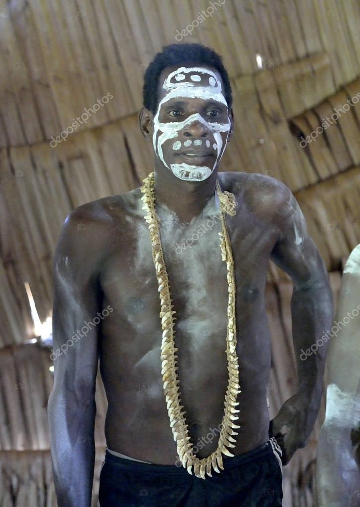 Head hunter of tribe of Asmat Stock Editorial Photo © SURZet 129996146
