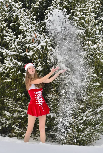 Santa-girl in pine forest — Stock Photo, Image